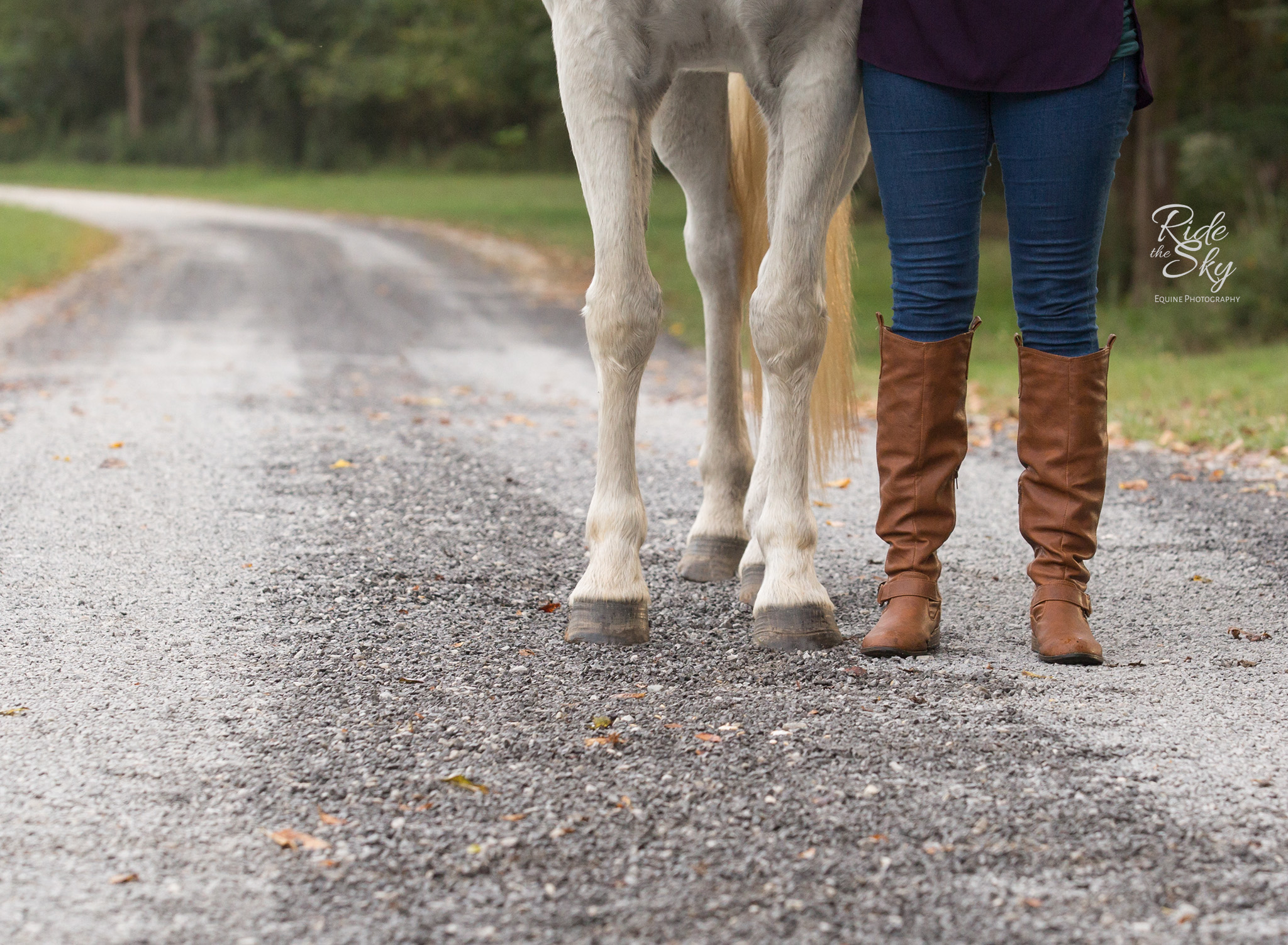 Boots and Horse Hooves on Gravel Road