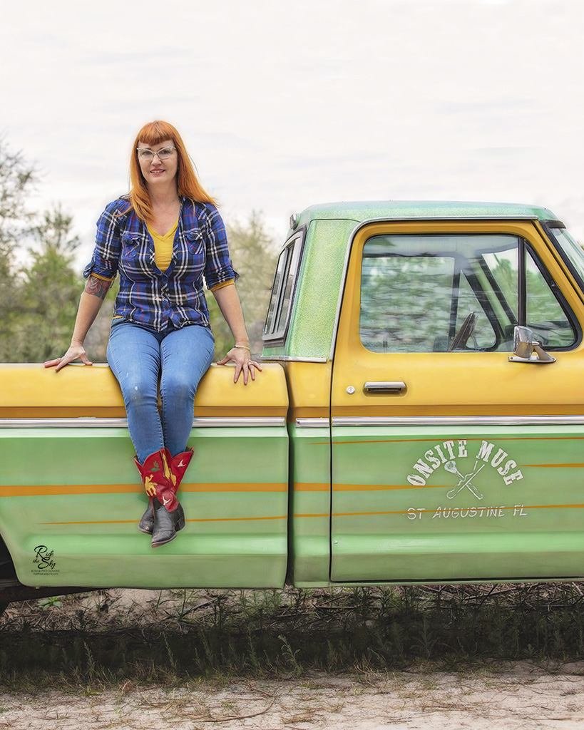 Kira McCarty of Onsite Muse sitting on her Truck in Florida