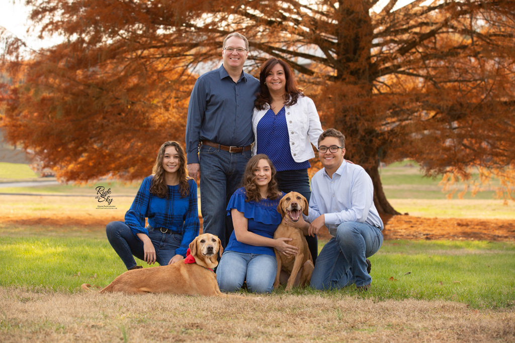 Black Mouth Cur Dogs with their Family in Fall