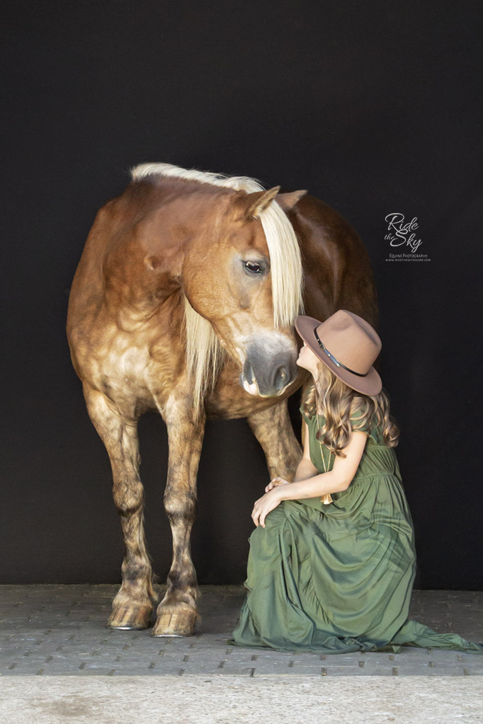 Girl in Green Dress with Haflinger in equestrian portrait session