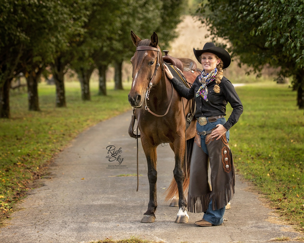 Allyssa Rennebu, Mustang Liberty and Trick Trainer, standing with her BLM Mustang Horse, Raven in Manchester Tennessee