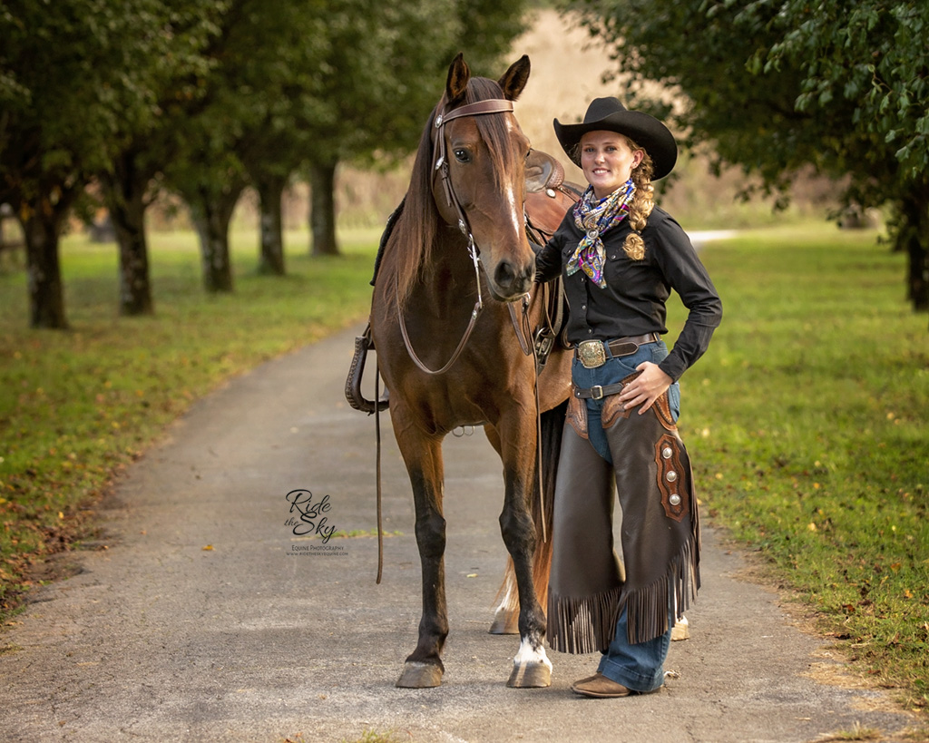 Mustang Horse Trainer Allyssa Rennebu with her liberty trick trained mustang Raven