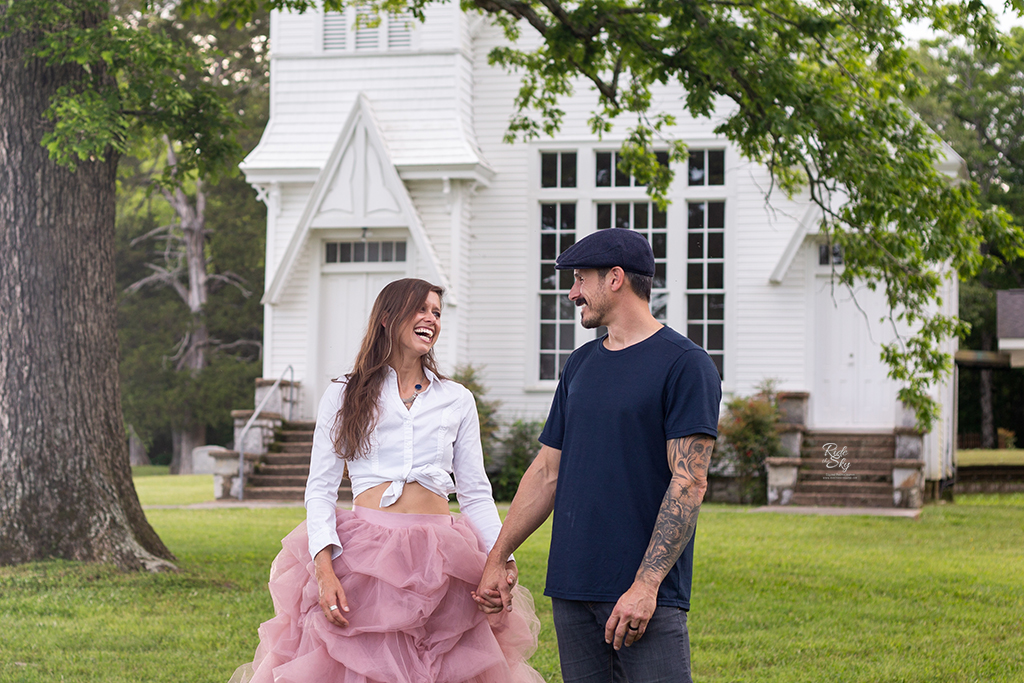 Woman and Man outside of church laughing