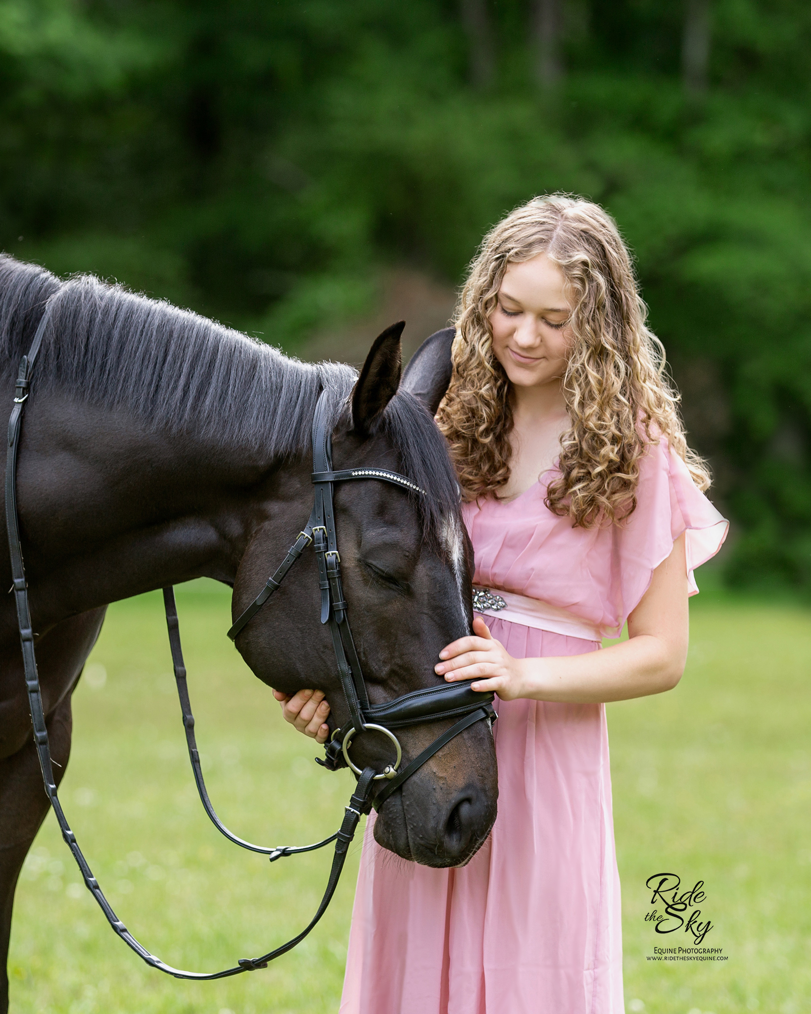 High School Senior photographed with her thoroughbred horse during a sweet moment