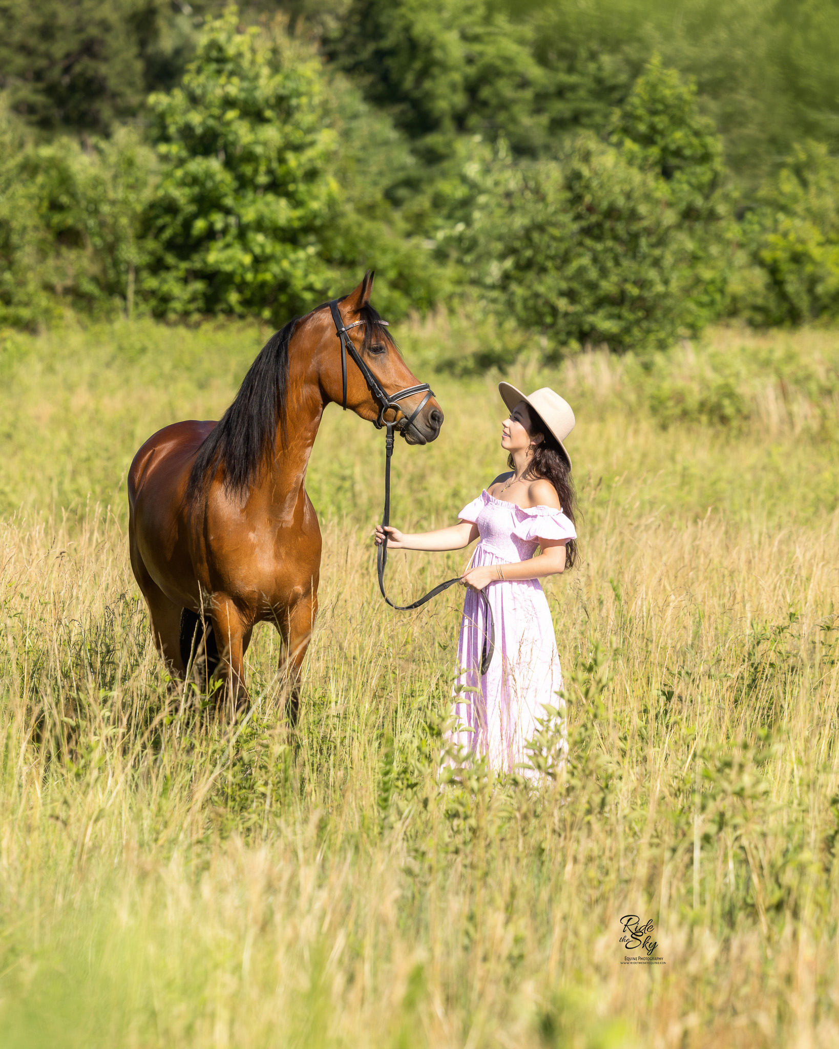 High School Senior photographed with her horse in field