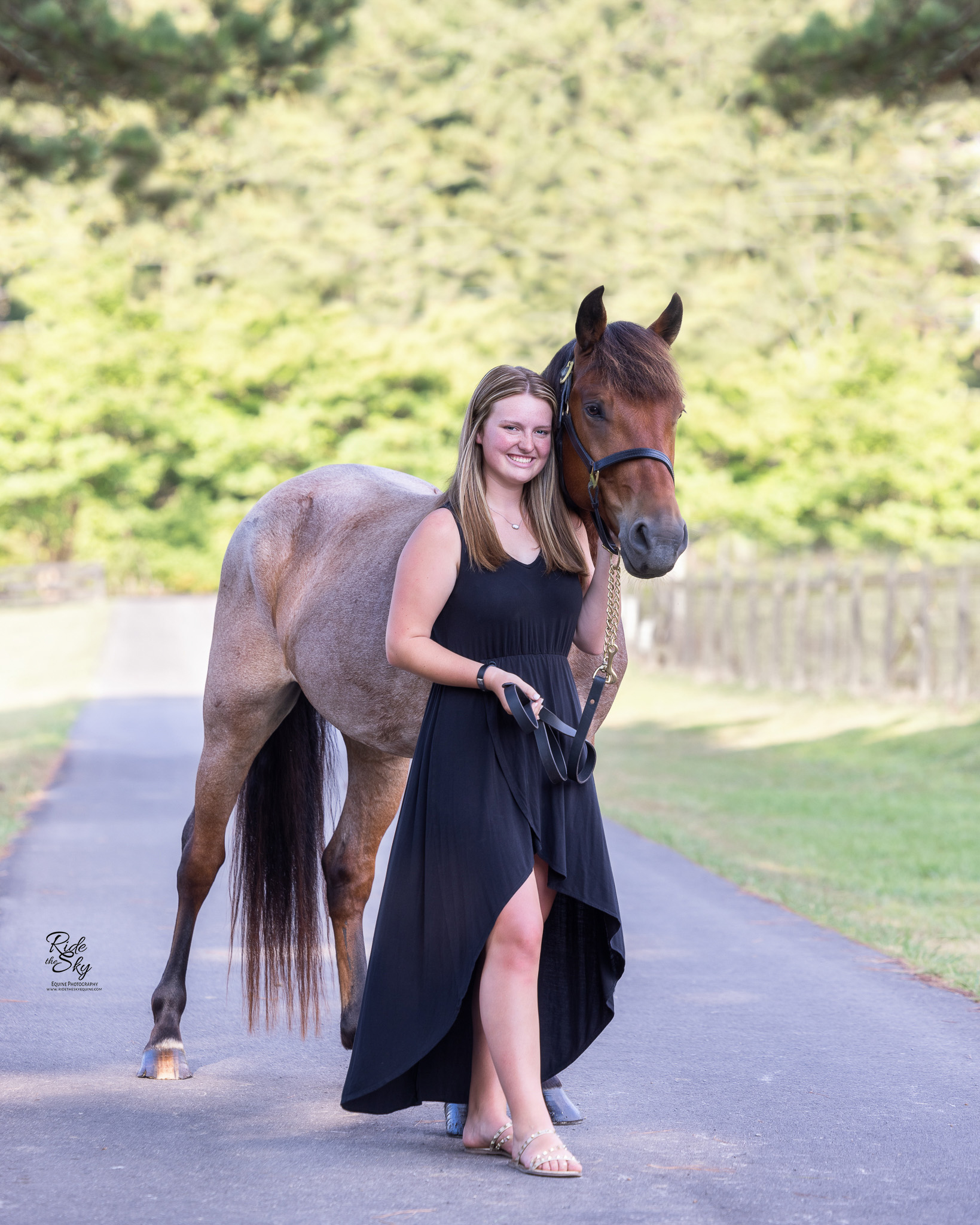 High School Senior Images with Horse standing on driveway in north Georgia