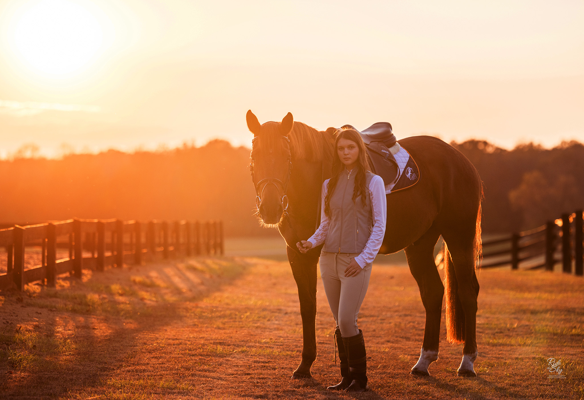 High School Senior photographed with her horse at sunset at Le Bonheur Equestrian