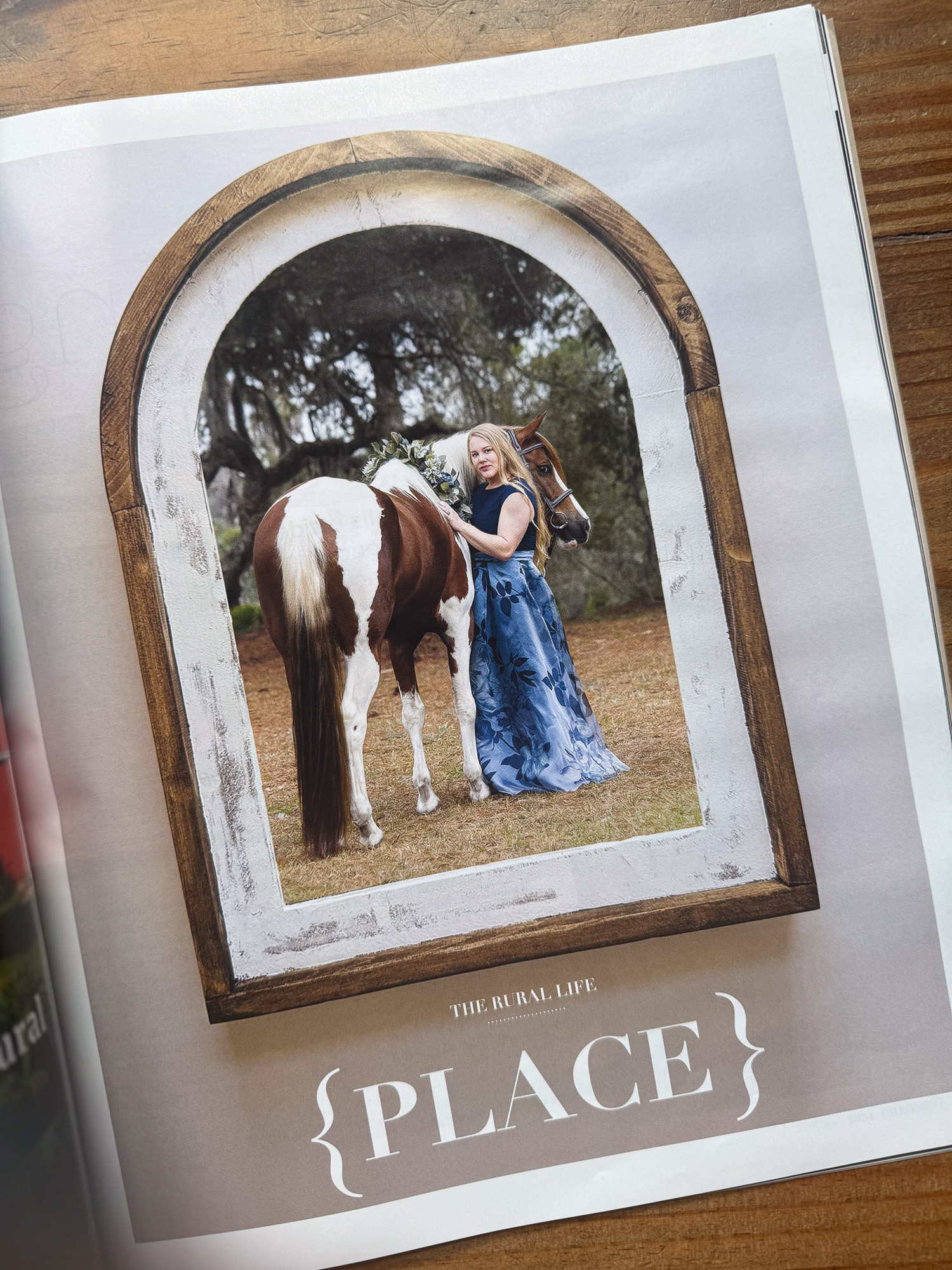 Picture of Chrome Magazine Article that interviewed Ride the Sky Equine Photography about creating gallery walls. This image features the Farm House Frame Arch with an image from Ride the Sky Equine Photography